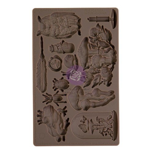 Forma silikonowa o wymiarach 20x13 cm - Prima Nature Academia. Zawiera zestaw 12 motywów inspirowanych naturą, m.in. sowa, żaba, grzyby, żuczki, piórko, ślimak. Idealna do decoupage, posiada również atest spożywczy.