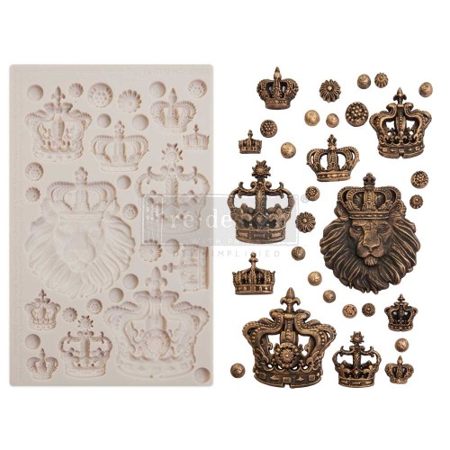 Forma silikonowa do odlewów o wymiarach 20x13 cm - Finnabair | Prima | Regalia. Zawiera motyw głowy lwa w koronie, 10 ozdobnych koron różnej wielkości i dekoracyjne rozetki. Idealne do desoupage i scrapbookingu.