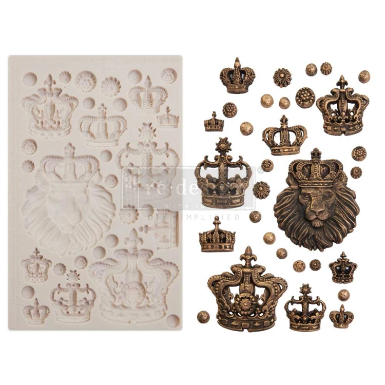 Forma silikonowa do odlewów o wymiarach 20x13 cm - Finnabair | Prima | Regalia. Zawiera motyw głowy lwa w koronie, 10 ozdobnych koron różnej wielkości i dekoracyjne rozetki. Idealne do desoupage i scrapbookingu.