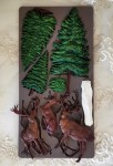 Foremka silikonowa do odlewów o wymiarach  25x13 cm marki Prima wzór Evergreen Christmas Magic. Na zdjęciu gotowe, pomalowane odlewy.
