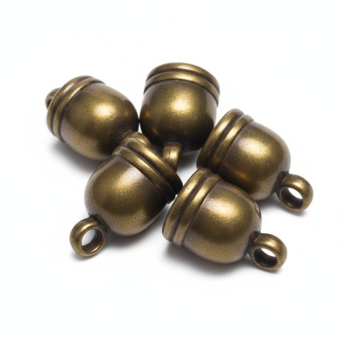 Przekładka, ozdobna końcówka w kształcie dzwonka. Średnica 8 mm,  wysokość 12 mm, kolor antyczne złoto. Imitacja metalu, ilość 5 sztuk. Sprawdzi się jako nakładka do koralików, wykończenie bombek, jajek i biżuterii.